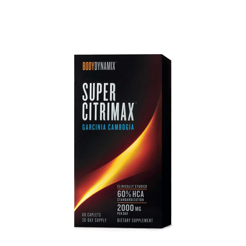 GNC Slimvance BodyDynamix capsules close-up ready to take with meals.