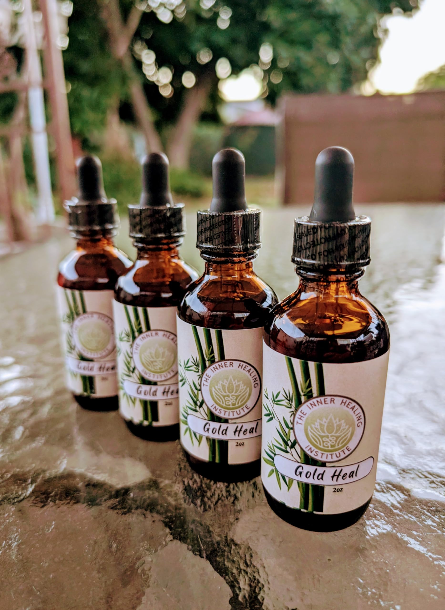 Gold Heal tincture being poured into water for convenient use.