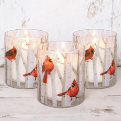 GORGE MOMENT cardinal candle in a jar enhances cozy holiday ambiance and birch-inspired decor.
