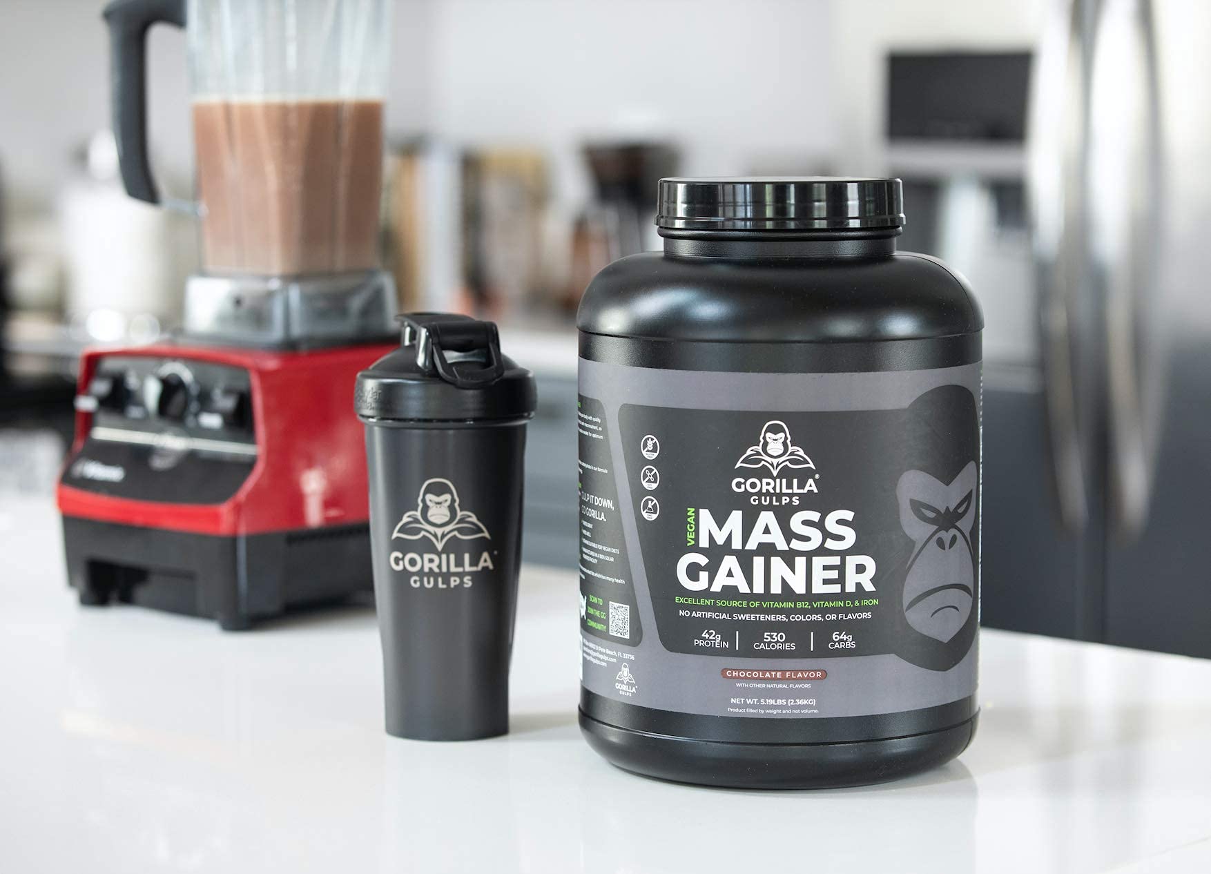 Gorilla Gulps mass gainer serving with spoon suggests meal replacement option.
