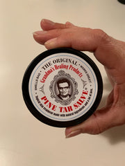 Grandma's Pine Tar Salve jar label, traditional formula for time-tested skin comfort on minor injuries.