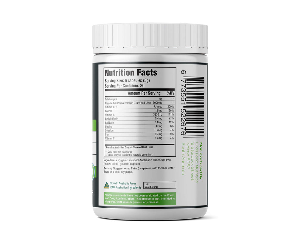 Grassland Nutrition beef liver capsules on a wooden surface for daily nutrition.