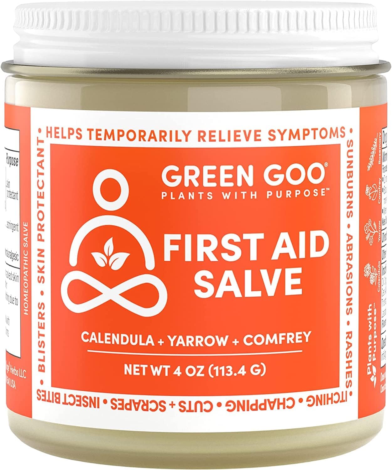 Green Goo First Aid Salve jar close-up showing herbal formula for skin healing.