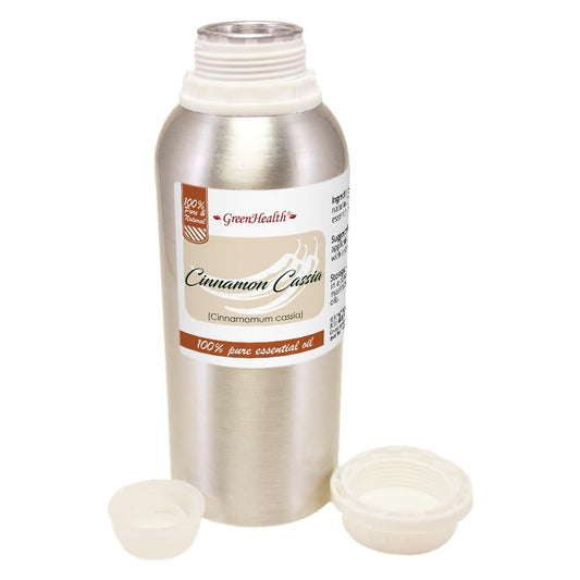GreenHealth Cinnamon Cassia oil beside a diffuser for cozy fragrance