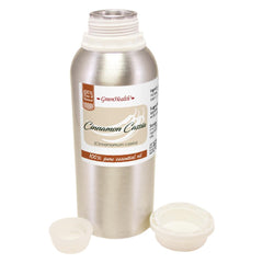 GreenHealth Cinnamon Cassia oil beside a diffuser for cozy fragrance
