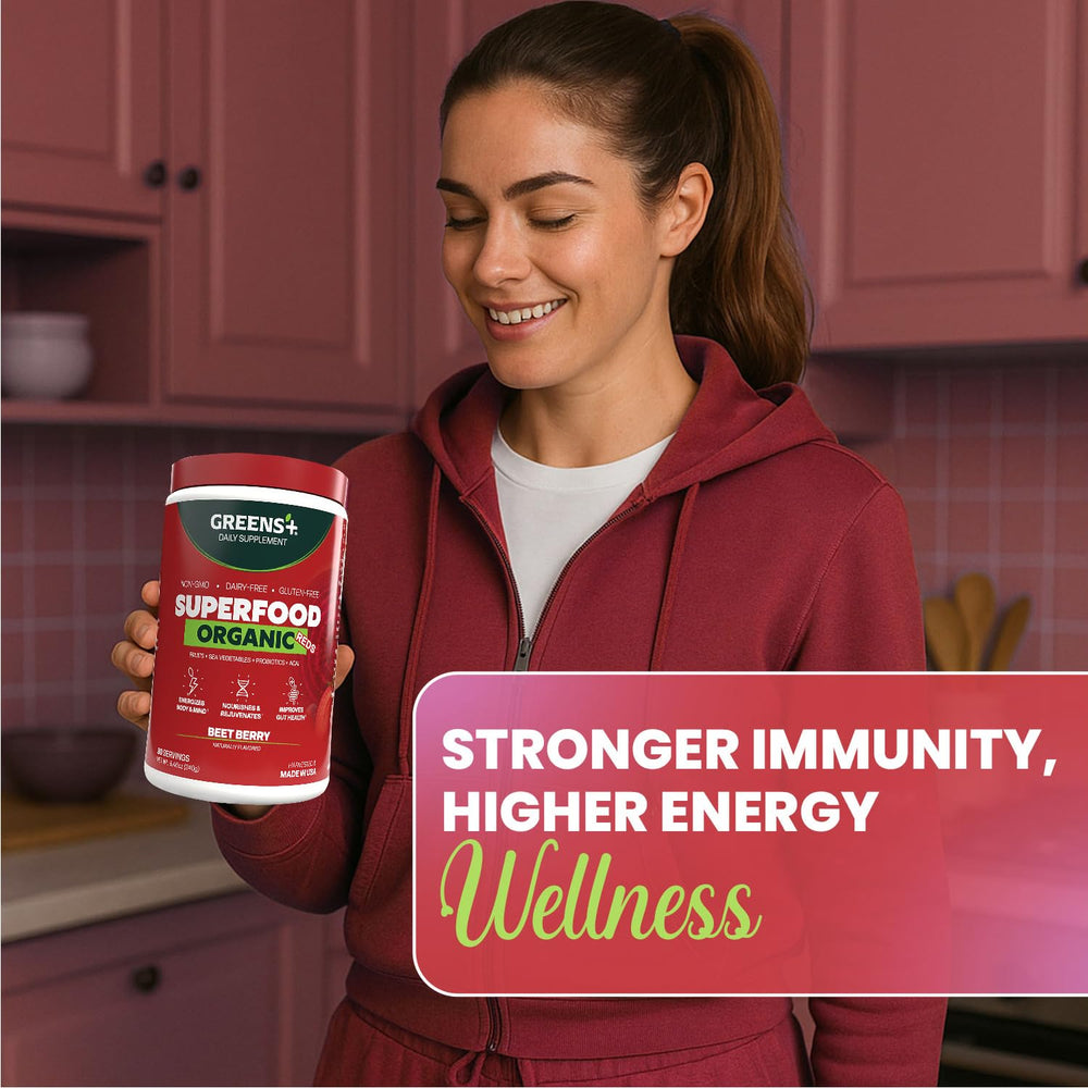 Greens+ Berry-pomegranate powder pours into a glass for a smoothie boost.