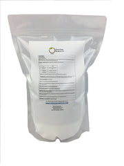 Greenway Biotech Magnesium Chloride powder scoop beside the canister for precise daily dosing.