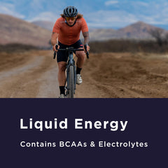 Athlete on the go using GU Liquid Energy Orange during training.