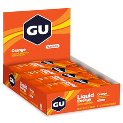 Close-up pour of GU Energy Liquid Energy Orange for fast absorption.