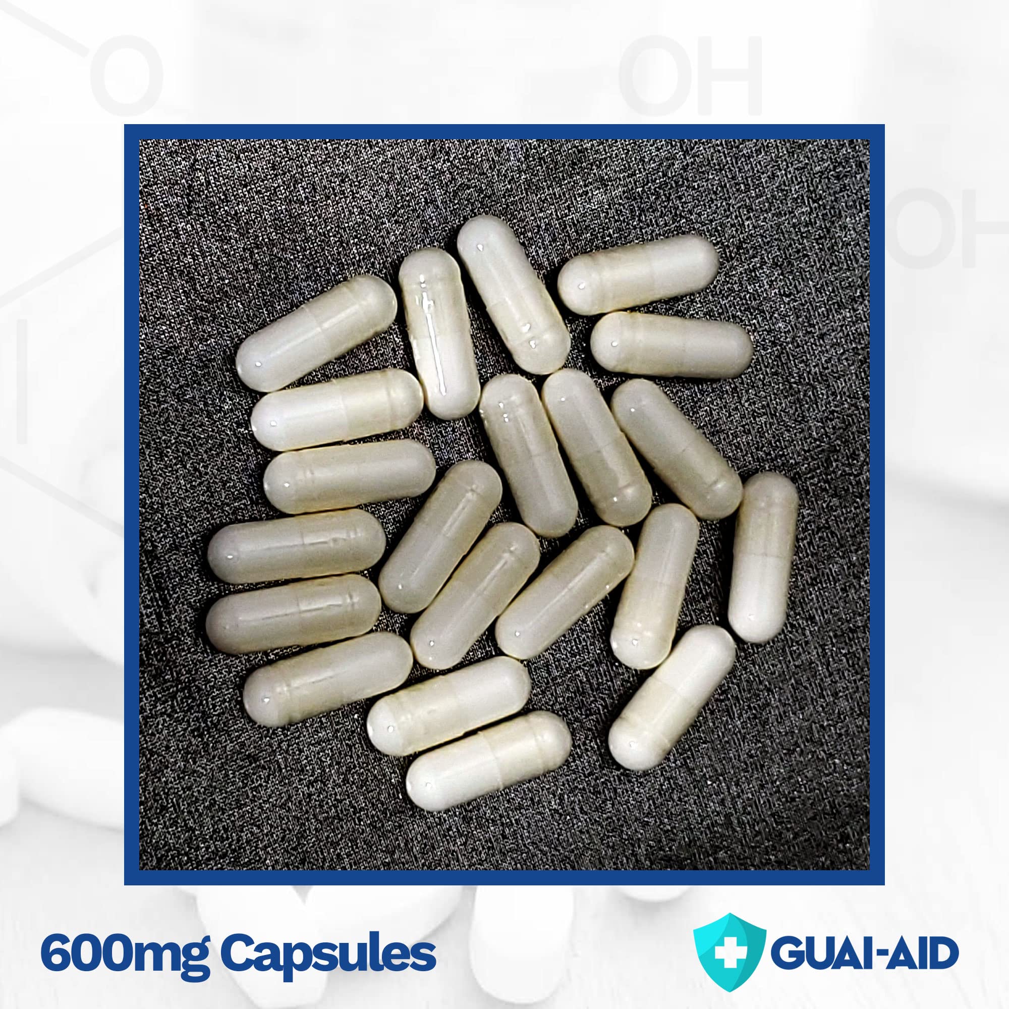 GUAI-AID label closeup shows 500-600mg guaifenesin per capsule.