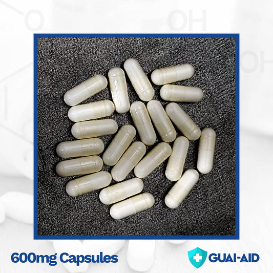 GUAI-AID label closeup shows 500-600mg guaifenesin per capsule.