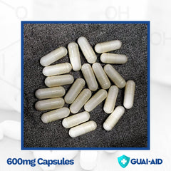GUAI-AID label closeup shows 500-600mg guaifenesin per capsule.