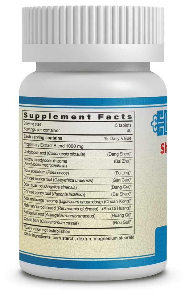 Guang Ci Tang Shi Quan Da Bu Pian tablets closeup with hints of energy support.