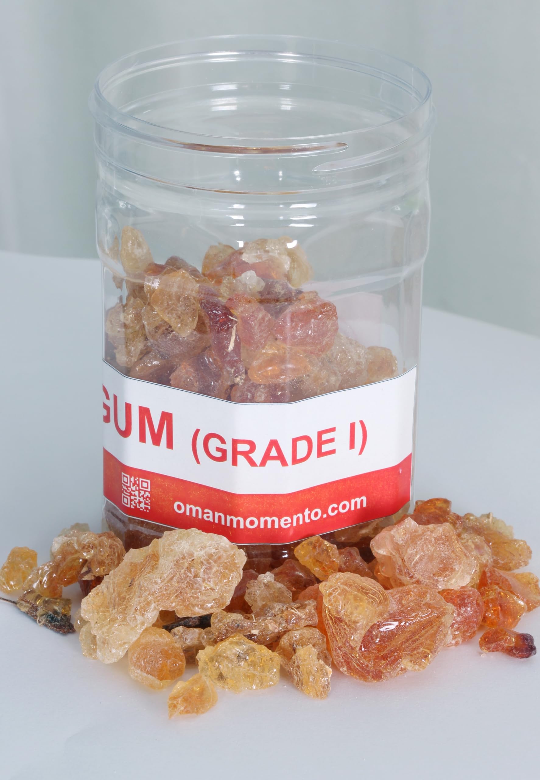 Oman Momento Gum Arabic being stirred into tea for smooth texture.
