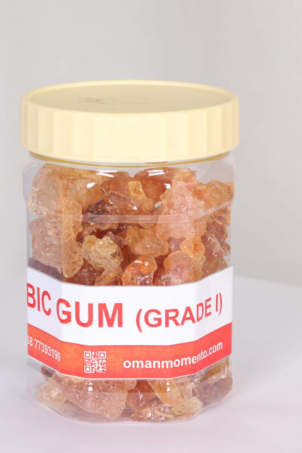 Oman Momento amber jar packaging shows natural grade Arabic gum for crafts.