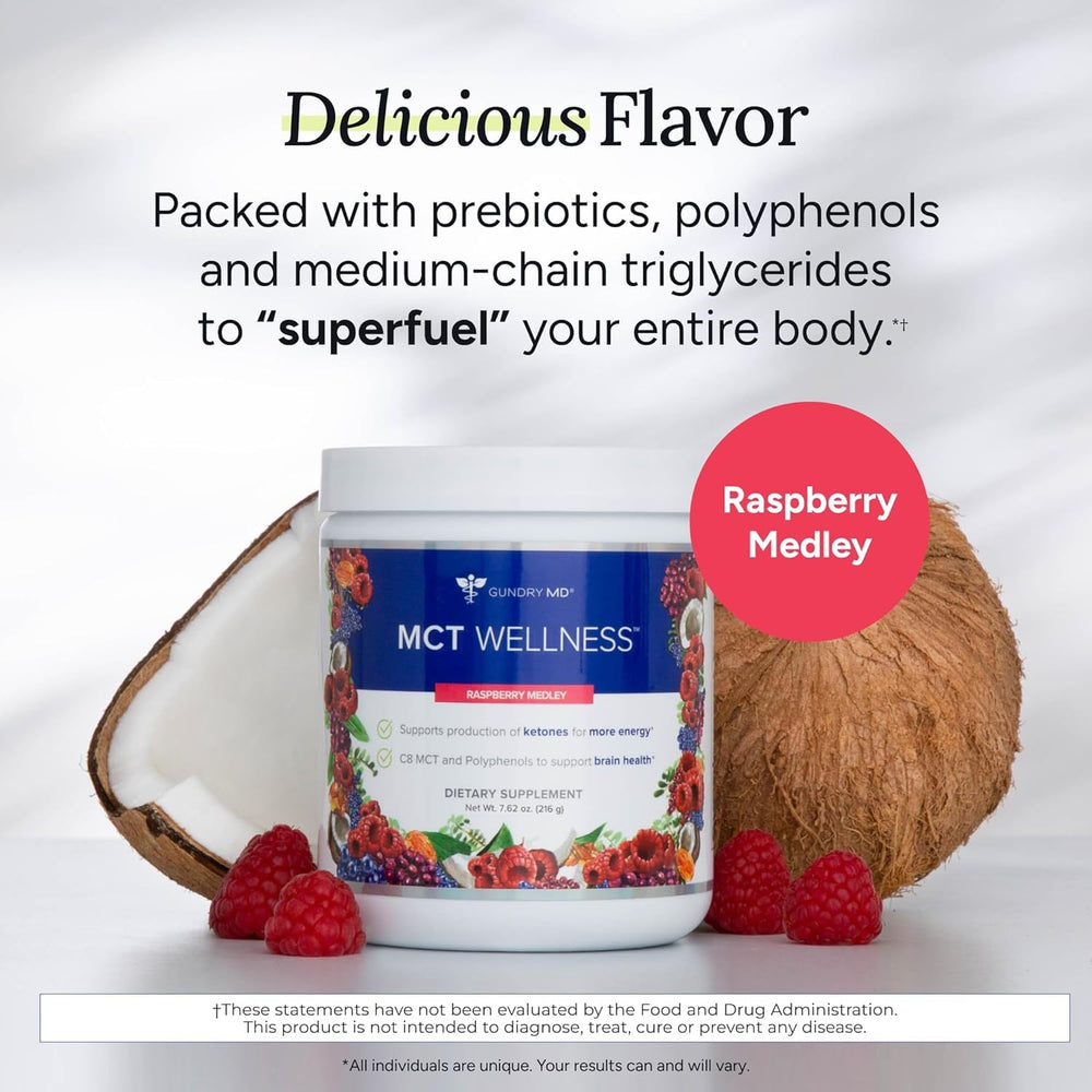 Scoop of Gundry MD MCT Wellness Raspberry powder next to glass of water