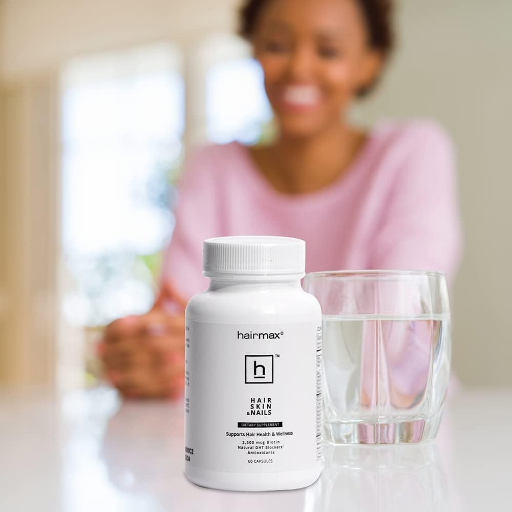 Hairmax packaging emphasizes suitability for all hair types and overall hair health