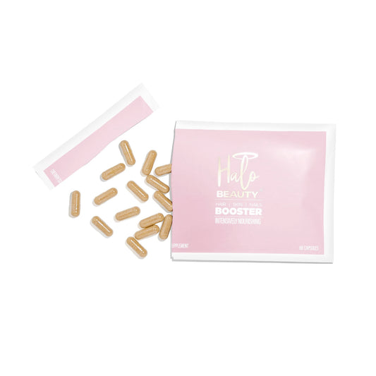 Halo Beauty refill pack bottle closeup showing convenient one-month vegan capsules.