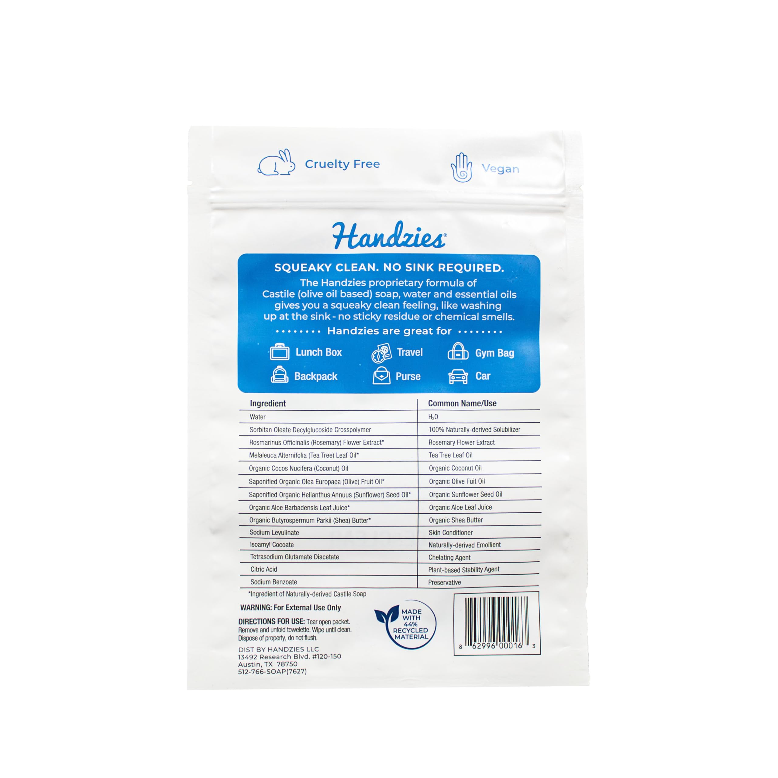 Handzies wipes on the go being used in a car for quick cleanups.