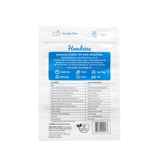 Handzies wipes on the go being used in a car for quick cleanups.