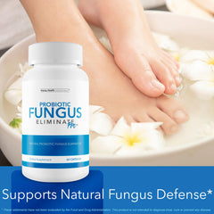Bottle with glass of water suggests easy daily use for nails.