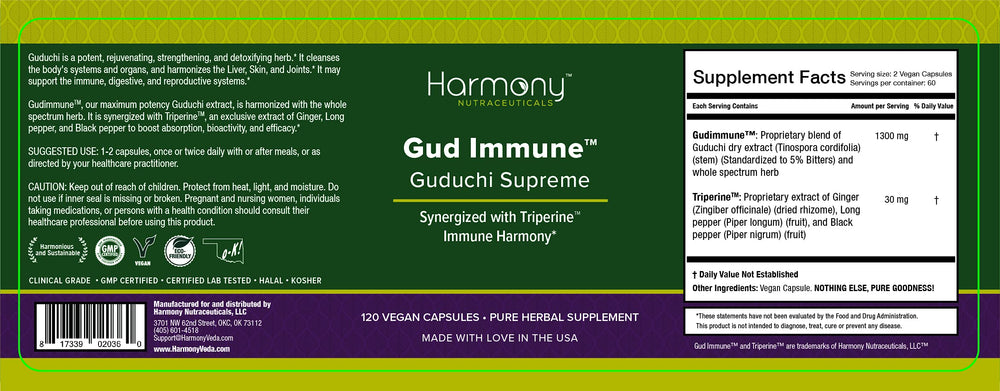 Guduchi Supreme capsules close-up highlighting vegan organic formulation.