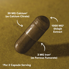 Havasu Shilajit Capsules on a natural wood surface in natural light.