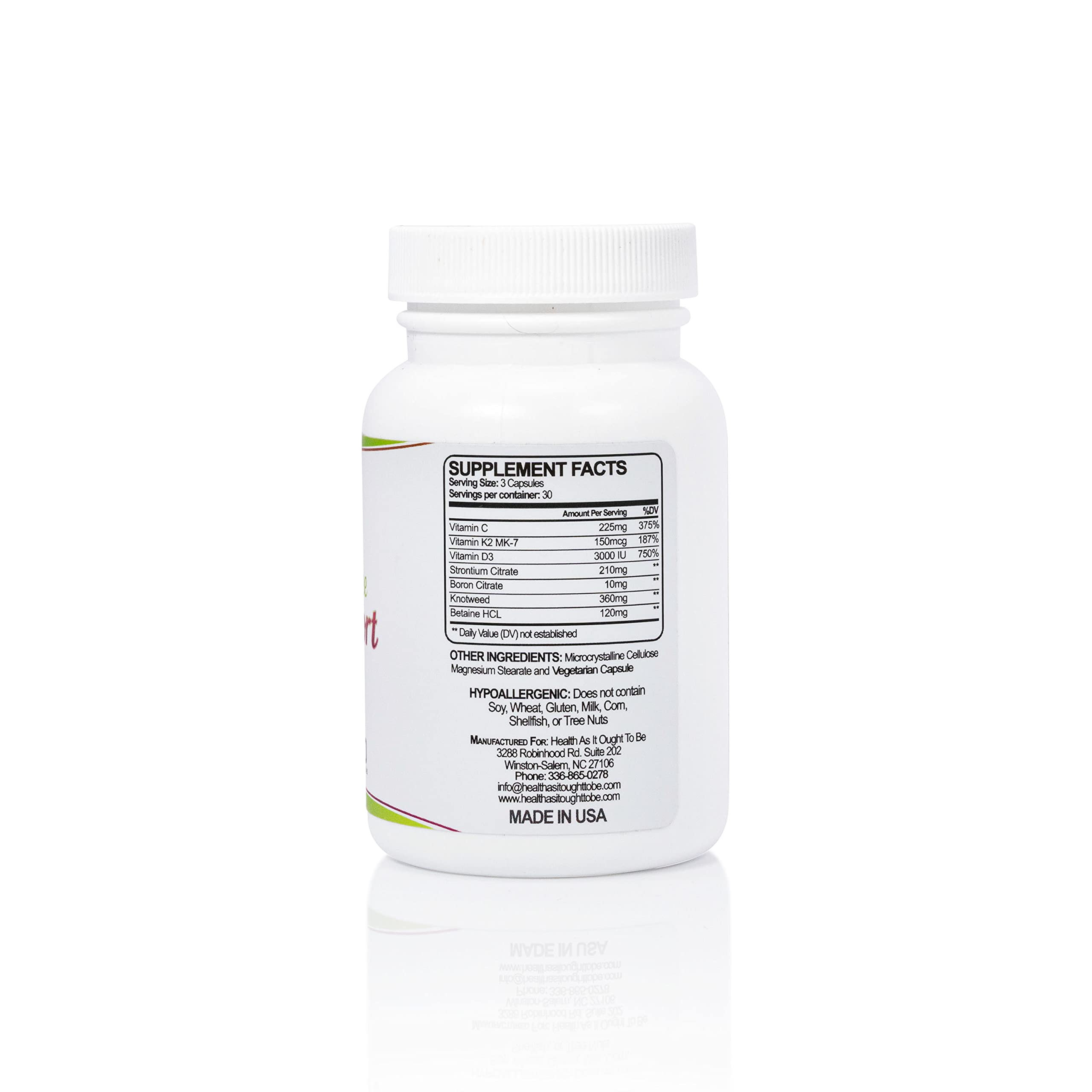 Health As It Ought To Be calcium-free bone support capsules close-up with natural ingredients.