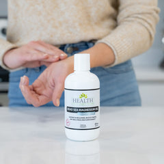Health As It Ought To Be Dead Sea Magnesium Oil bottle with label visible indicates ample daily use.