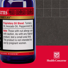 Health Concerns Tamu Oil being applied on hands for easy absorption on irritated skin.