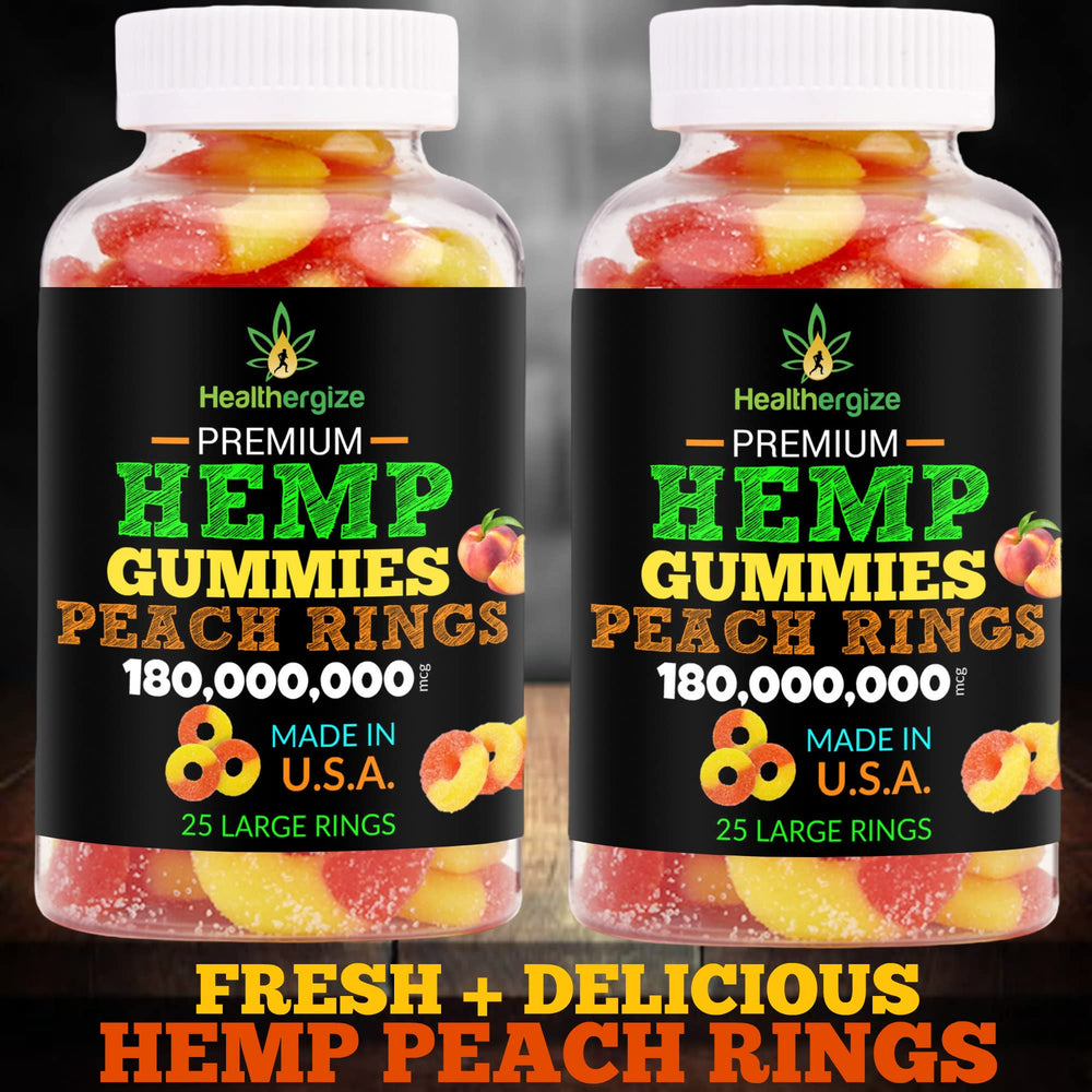 Healthergize bottle open revealing bright peach gummies ready to enjoy.