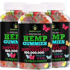 Healthergize 3-pack hemp gummies fruity butterflies on desk for daily enjoyment.