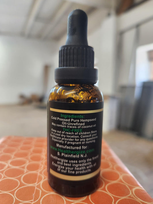 Healthergize Hemp Oil pour demonstrates smooth flow for everyday routines.