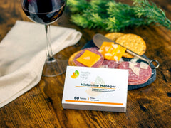 Healthy Habits Living Histamine Manager tablet with water for easy consumption.