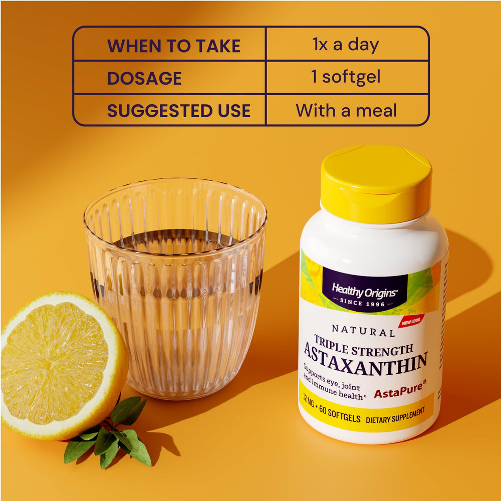 Healthy Origins Astaxanthin bottle on wood packaging.