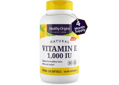 Healthy Origins Vitamin E 1000 IU softgels held in hand