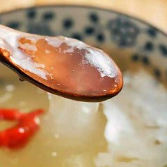 Helen Ou Kudzu root powder dissolving in cold water for a smooth beverage.