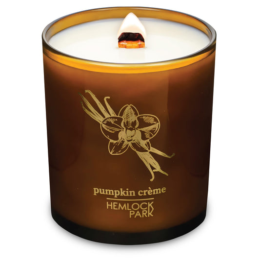 Hemlock Park Amber and Gold Wood Wick Candle with coconut wax for cozy ambiance.