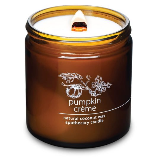 Hemlock Park candle in amber jar with pumpkin creme scent for cozy evenings