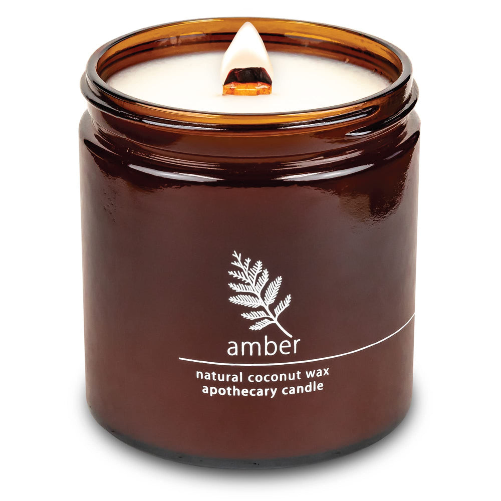 Hemlock Park crackling wooden wick candle in amber jar creates cozy ambiance