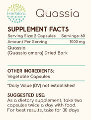 Close-up of HerbEra Quassia capsule showing 500 mg dosage