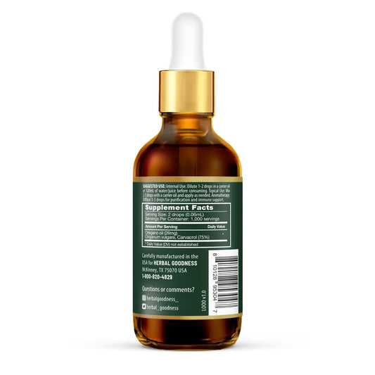 Close-up of Herbal Goodness oregano oil dropper ready for versatile sublingual use.