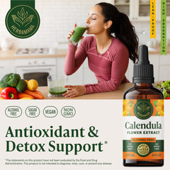 HERBAMAMA Calendula tincture dropper releasing drops for rapid absorption.