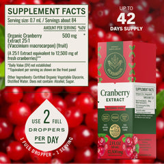 Dropper releasing HERBAMAMA Cranberry Drops for convenient dosing.