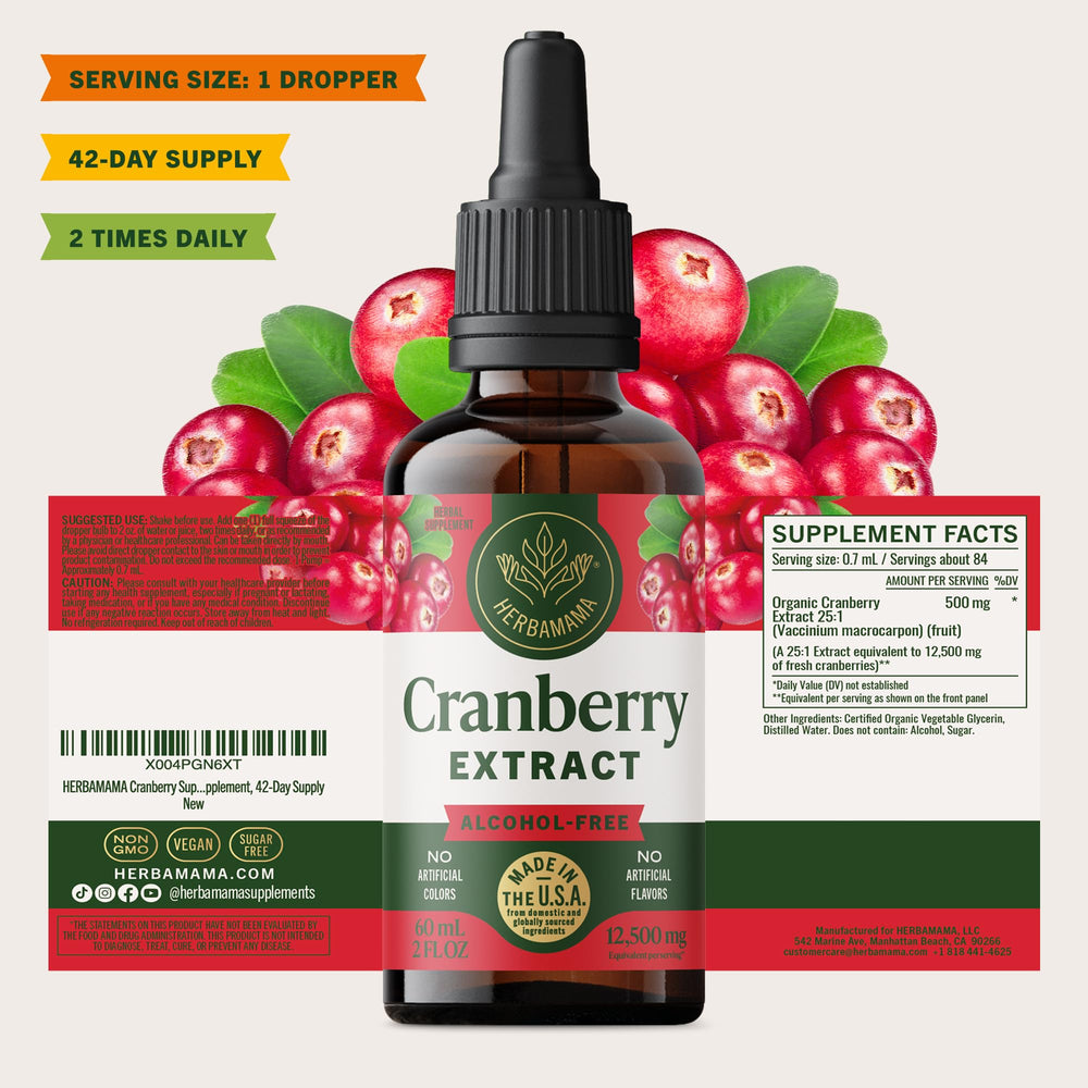 Glass of water with HERBAMAMA Cranberry Drops ready for daily use.