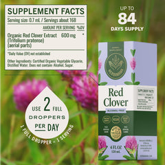 HERBAMAMA Red Clover Drops being poured into water for easy intake.