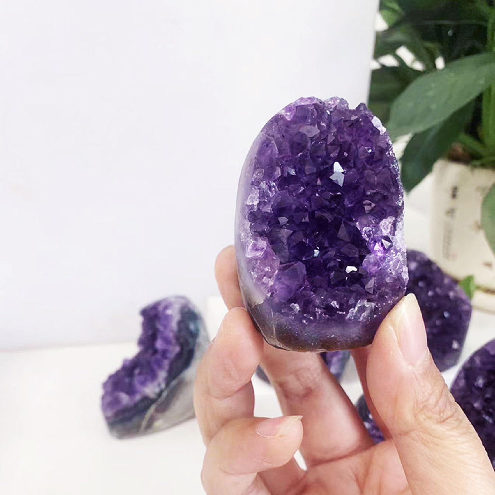 HIBCIGA raw amethyst cluster closeup reveals intricate crystal formations.