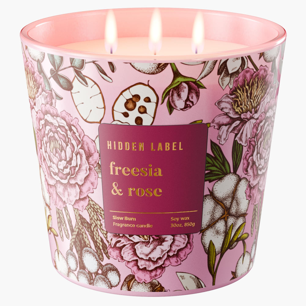 Hidden Label giant candle freesia rose 3-wick design, rich floral throw for open spaces.