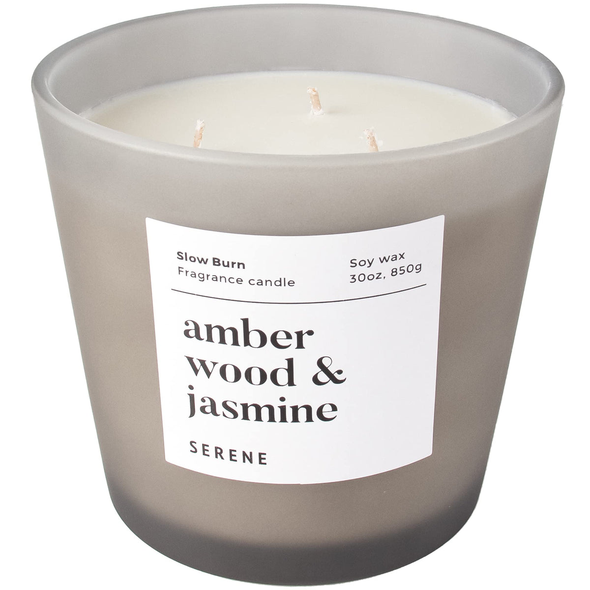 Hidden Label large candle in amber wood and jasmine for open living spaces.