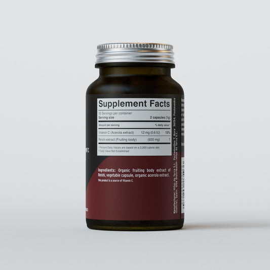 Closeup of HIFAS DA TERRA Mico-Rei capsules showing high-potency reishi extract.